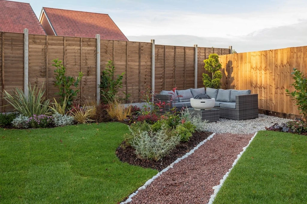 Outdoor seating in the corner of a garden
