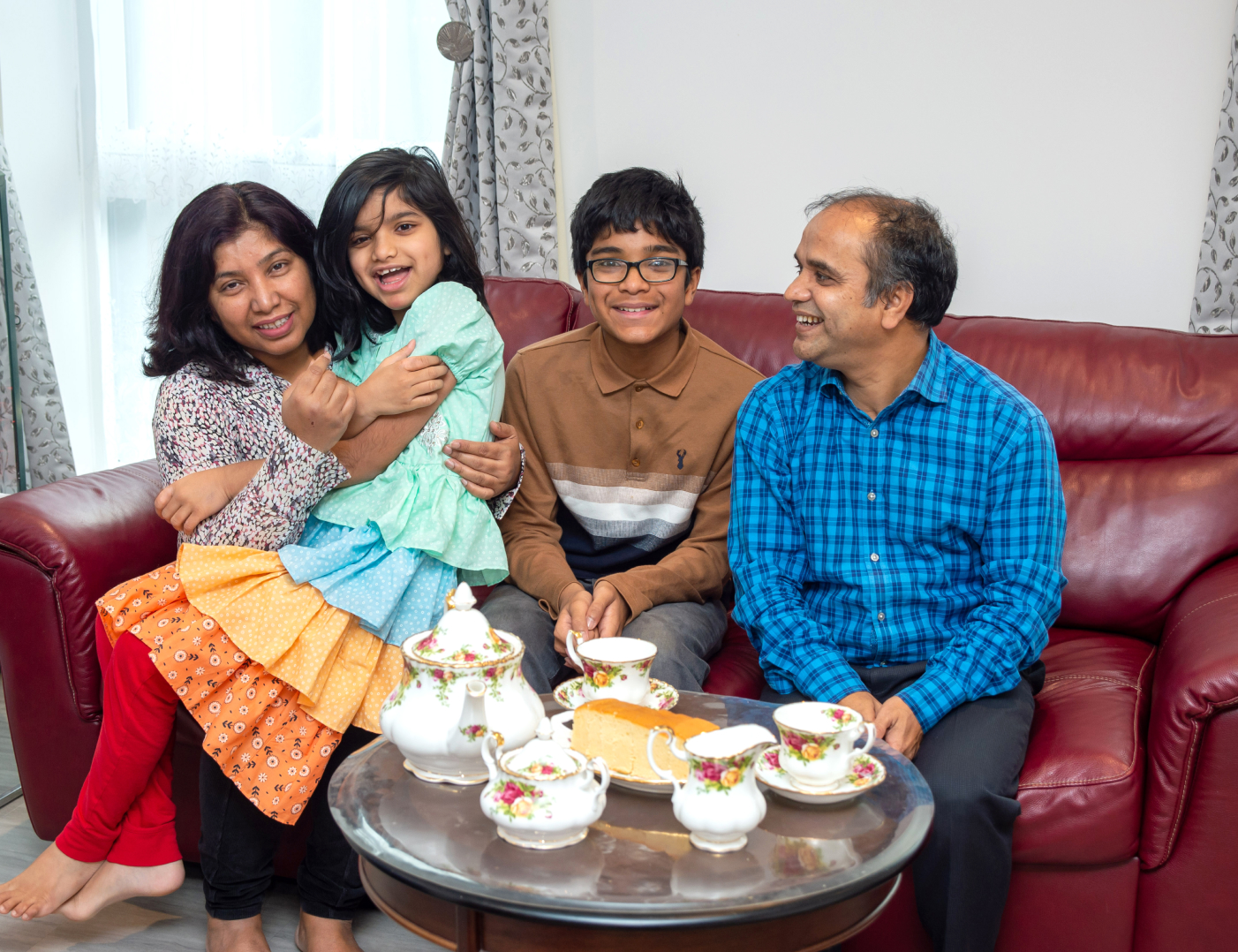 Bellway family on sofa